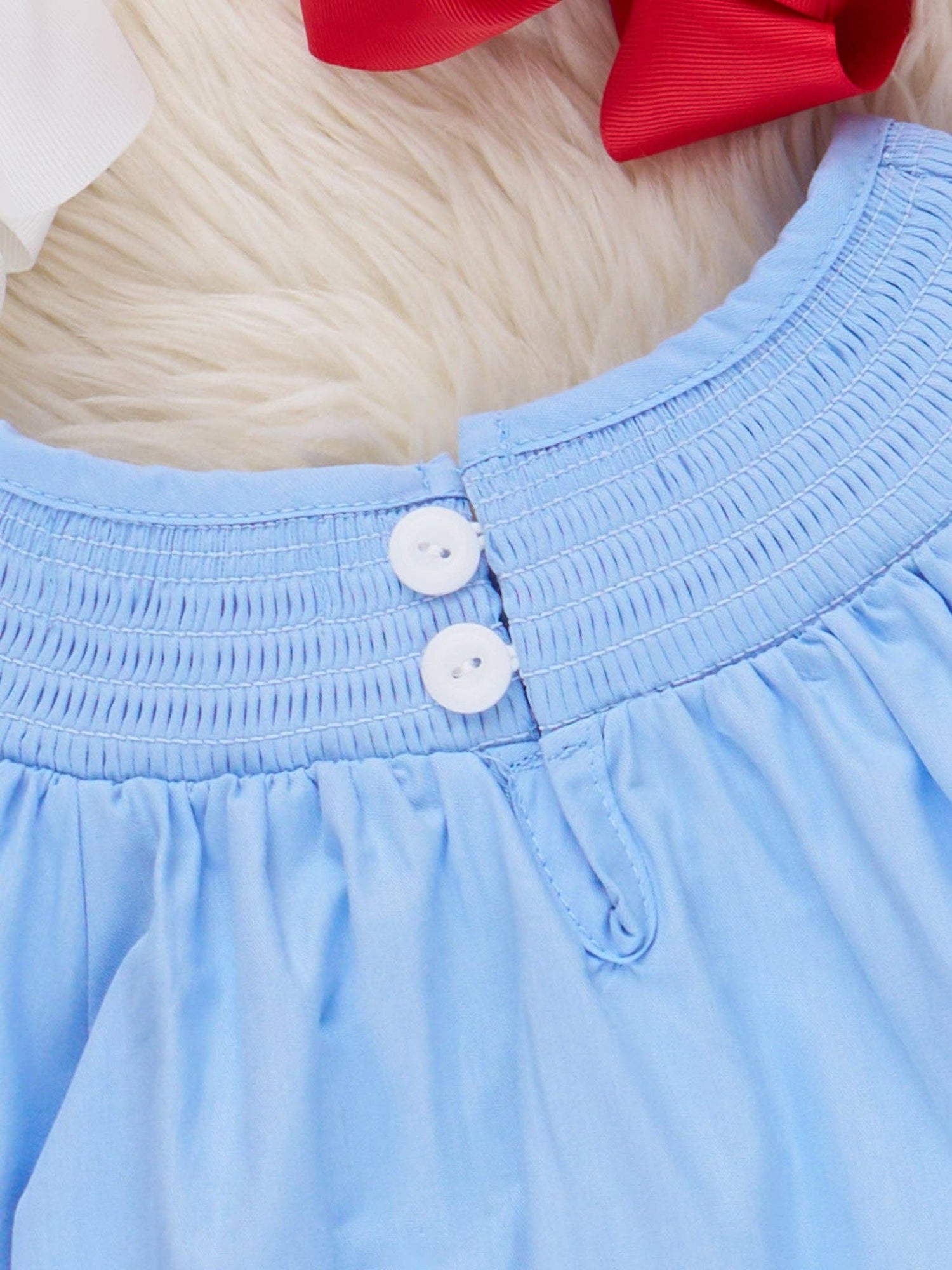 Blue Chambray Smocked Santas Ruffle Dress